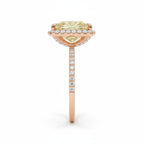 My Store 4 18K solid gold ring featuring a fancy yellow radiant-cut diamond in a sparkling halo setting, side view.