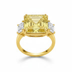 My Store 4 18K solid gold trilogy ring featuring a radiant-cut fancy yellow lab-grown diamond and side stones.