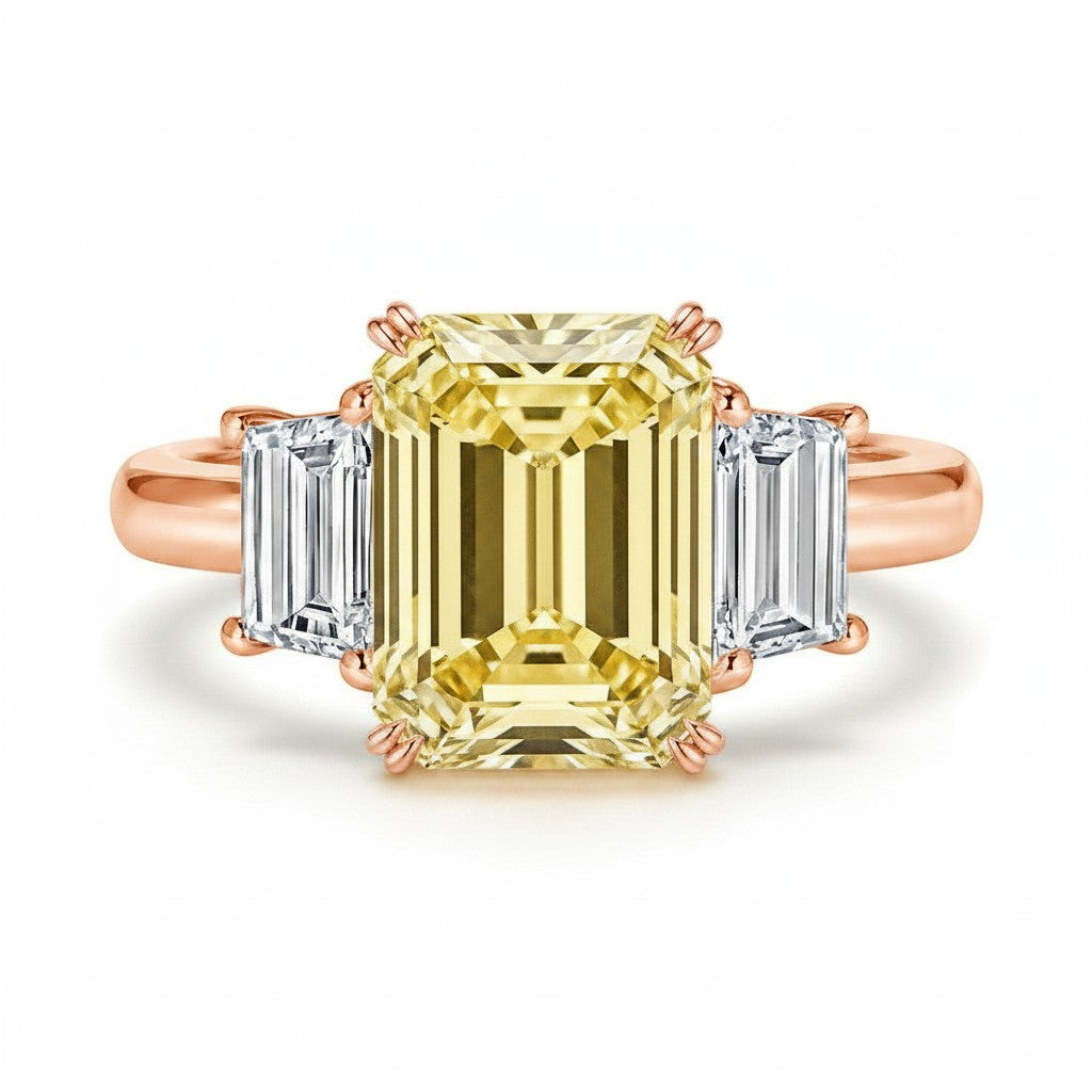 My Store 4 18K gold trilogy ring featuring a radiant-cut fancy yellow lab-grown diamond with side baguette diamonds.