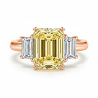 My Store 4 18K gold trilogy ring featuring a radiant-cut fancy yellow lab-grown diamond with side baguette diamonds.