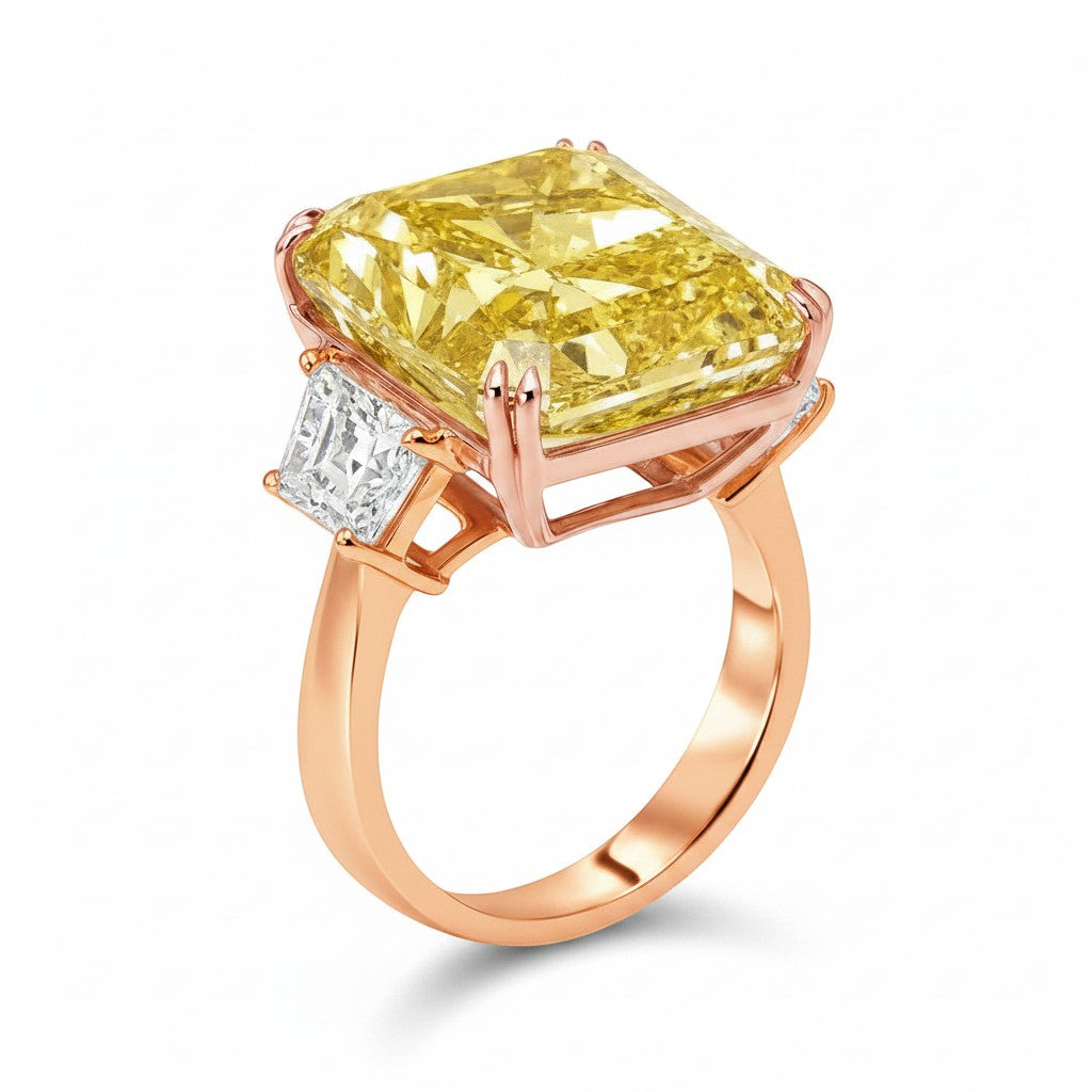 My Store 4 18K gold trilogy ring featuring a radiant-cut fancy yellow lab-grown diamond and side accent diamonds.