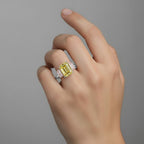 My Store 4 18K gold trilogy ring featuring a radiant-cut fancy yellow lab diamond flanked by two pink side stones.