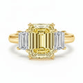 My Store 4 18K solid gold trilogy ring featuring a radiant-cut fancy yellow lab-grown diamond and side diamonds.