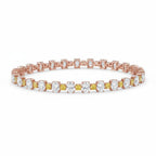 My Store 4 two-tone tennis bracelet featuring alternating fancy yellow cushion-cut and white oval-cut diamonds in gold.