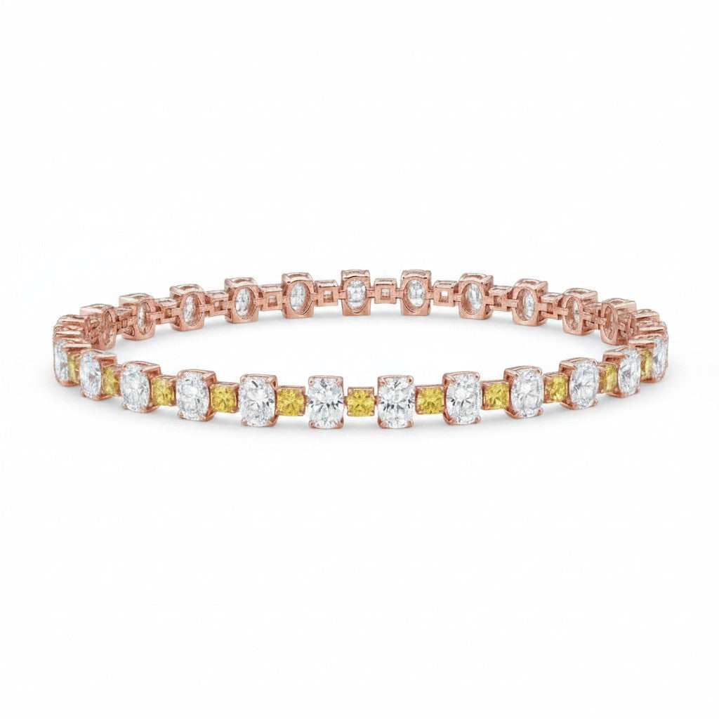 My Store 4 two-tone tennis bracelet featuring alternating fancy yellow cushion-cut and white oval-cut diamonds in gold.