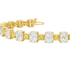 My Store 4 two-tone tennis bracelet with fancy yellow cushion-cut and white oval-cut diamonds in gold settings.