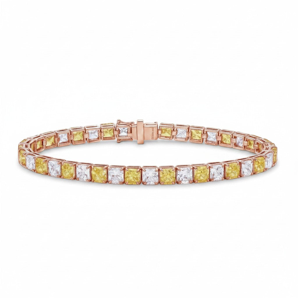 My Store 4 two-tone tennis bracelet featuring alternating fancy yellow and white cushion-cut diamonds in gold settings.