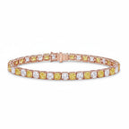 My Store 4 two-tone tennis bracelet featuring alternating fancy yellow and white cushion-cut diamonds in gold settings.