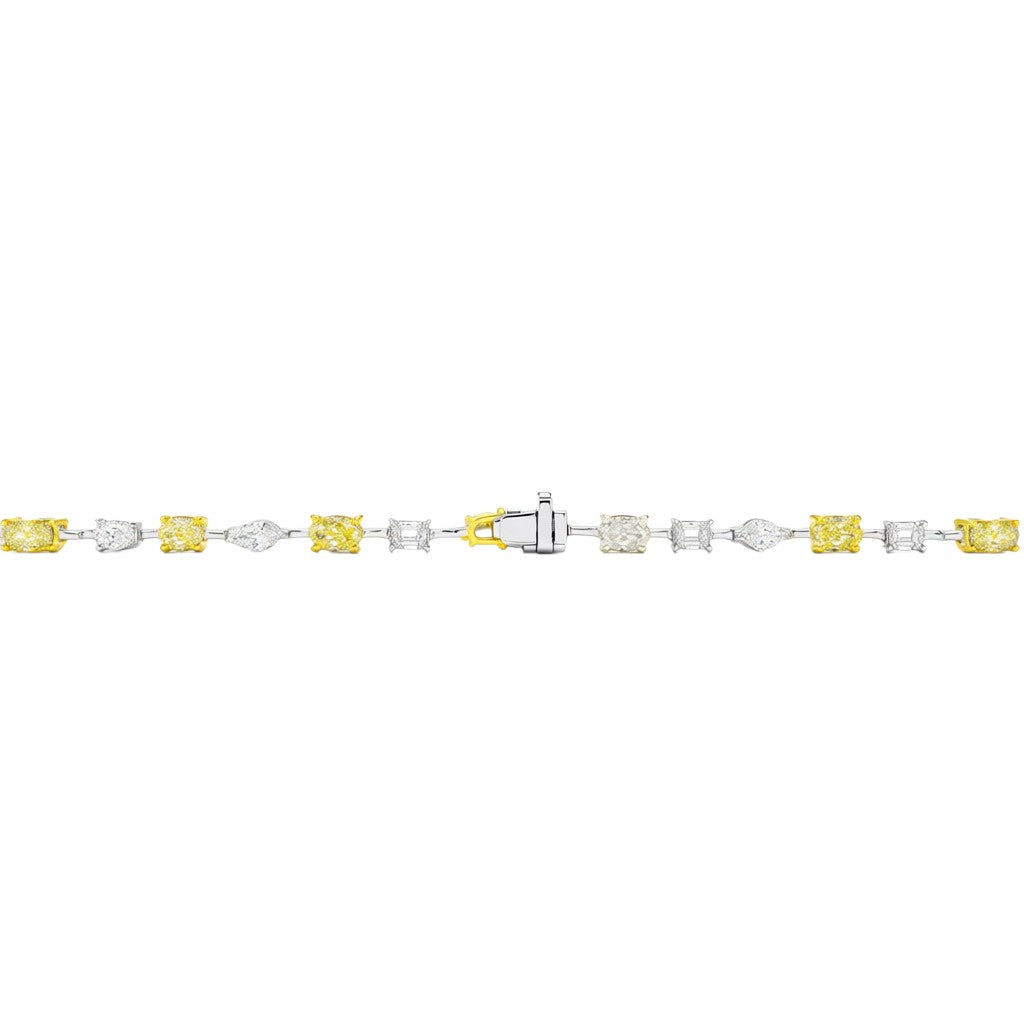 My Store 4 two-tone gold tennis bracelet featuring fancy yellow oval diamonds and multi-shape white diamonds.