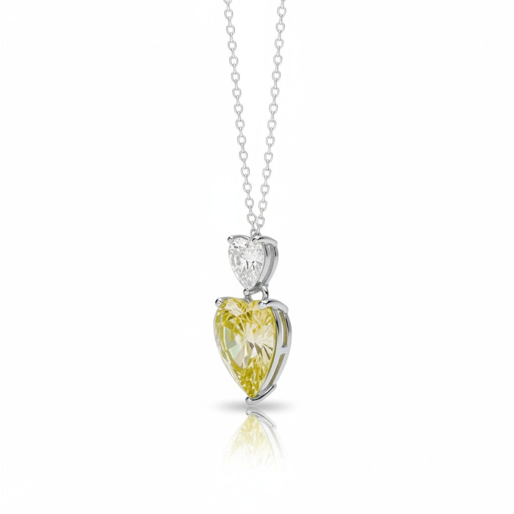 My Store 4 yellow and white heart-cut diamond pendant necklace in 18K white gold with an articulated drop design.