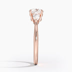 Round Cut Three-Stone Engagement Ring with Pear Side Accents in Solid Gold⁠