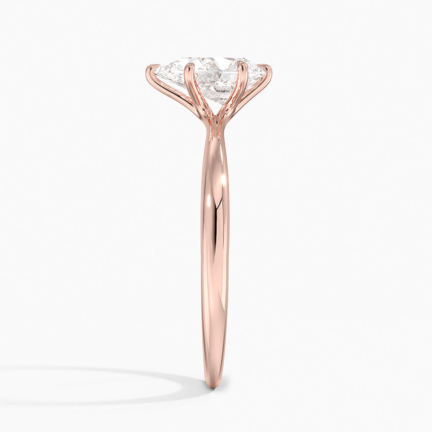 Pear Cut Solitaire Engagement Ring in Solid Gold⁠