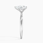 Pear Cut Solitaire Engagement Ring in Solid Gold⁠