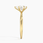 Pear Cut Solitaire Engagement Ring in Solid Gold⁠