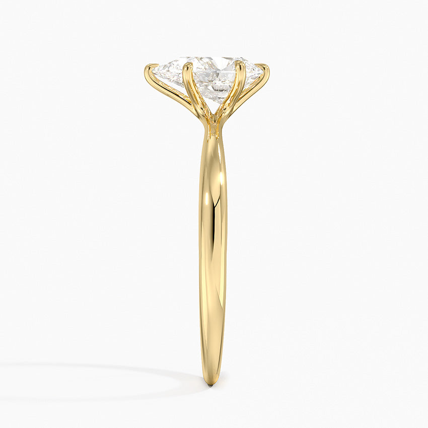 Pear Cut Solitaire Engagement Ring in Solid Gold⁠