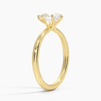 Pear Cut Solitaire Engagement Ring in Solid Gold⁠
