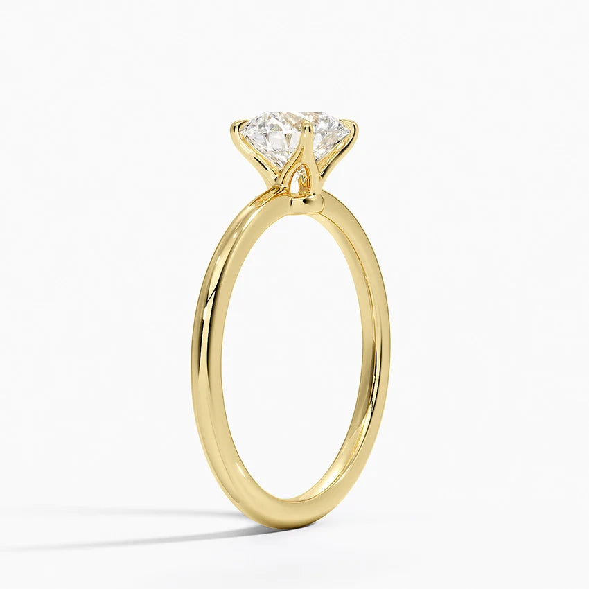 Classic Round Cut Solitaire Engagement Ring in Solid Gold⁠