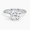 1.5 carat round lab-grown diamond solitaire engagement ring in white gold with 4-prong setting