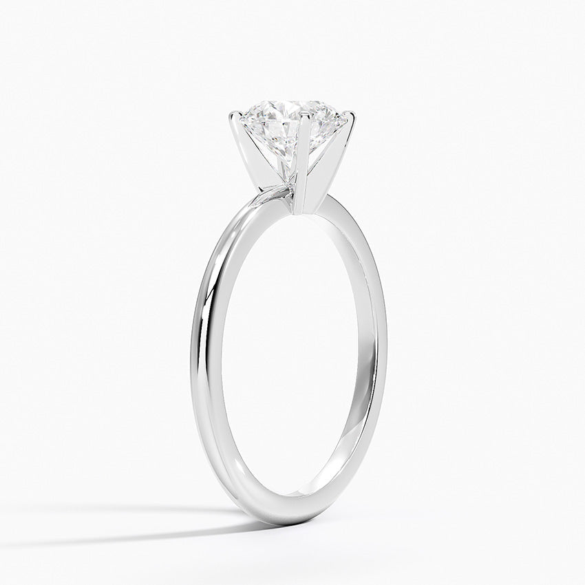 Classic Round Cut Solitaire Engagement Ring in Solid Gold⁠