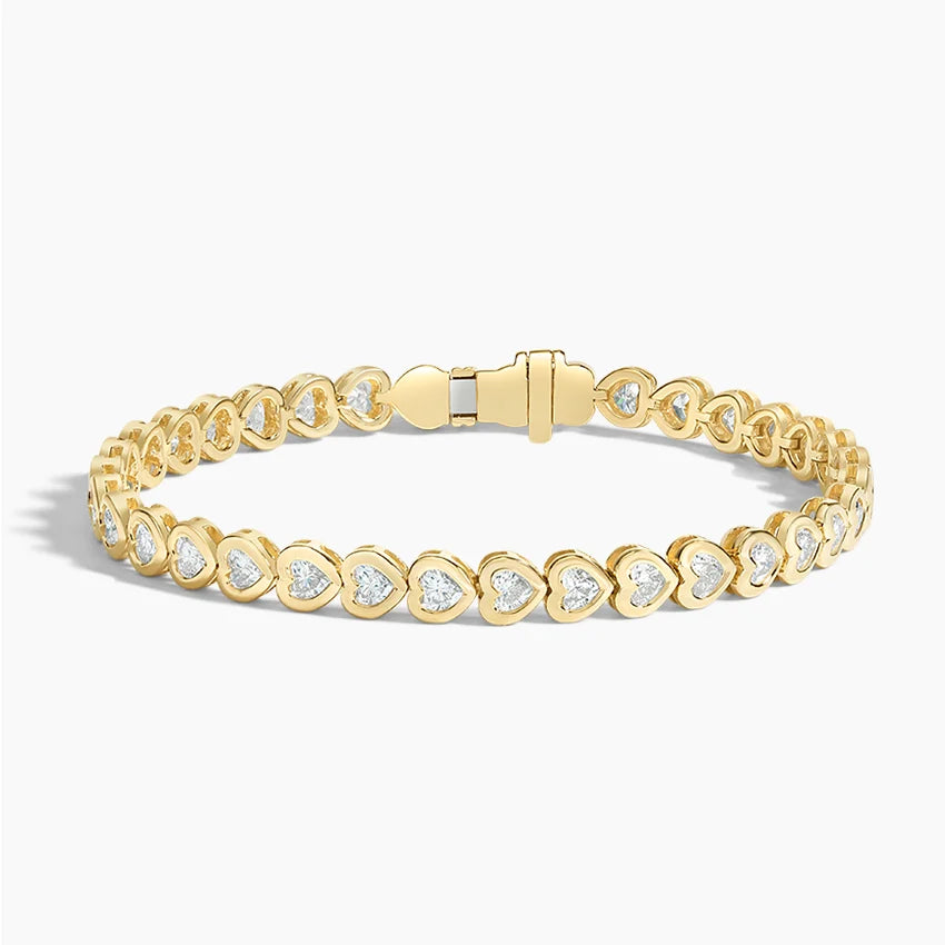 Yellow gold tennis bracelet with heart-shaped lab-grown diamonds, elegant jewelry