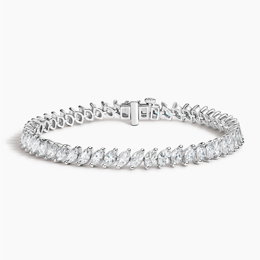 White gold tennis bracelet with marquise-cut lab-grown diamonds on white background