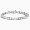 Princess cut diamond tennis bracelet in white gold set against a white background
