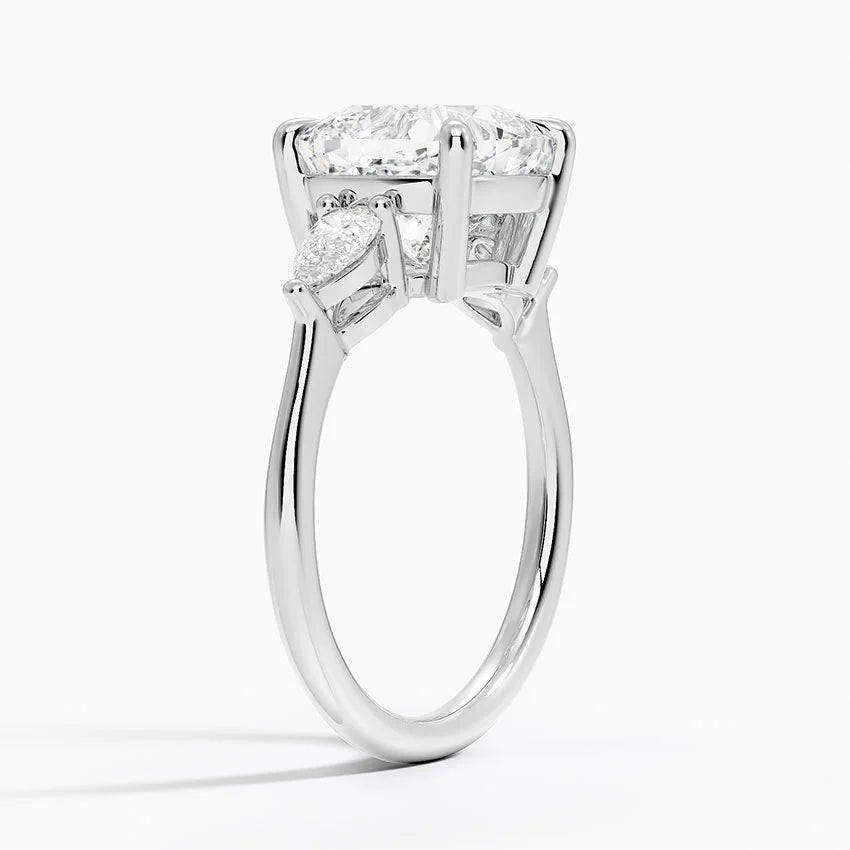 Pear Cut Three-Stone Engagement Ring in Solid Gold⁠