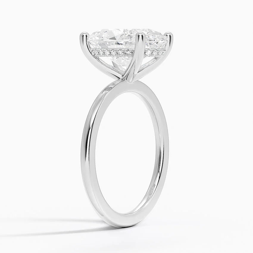 Pear Cut Diamond Solitaire Engagement Ring in Solid Gold⁠