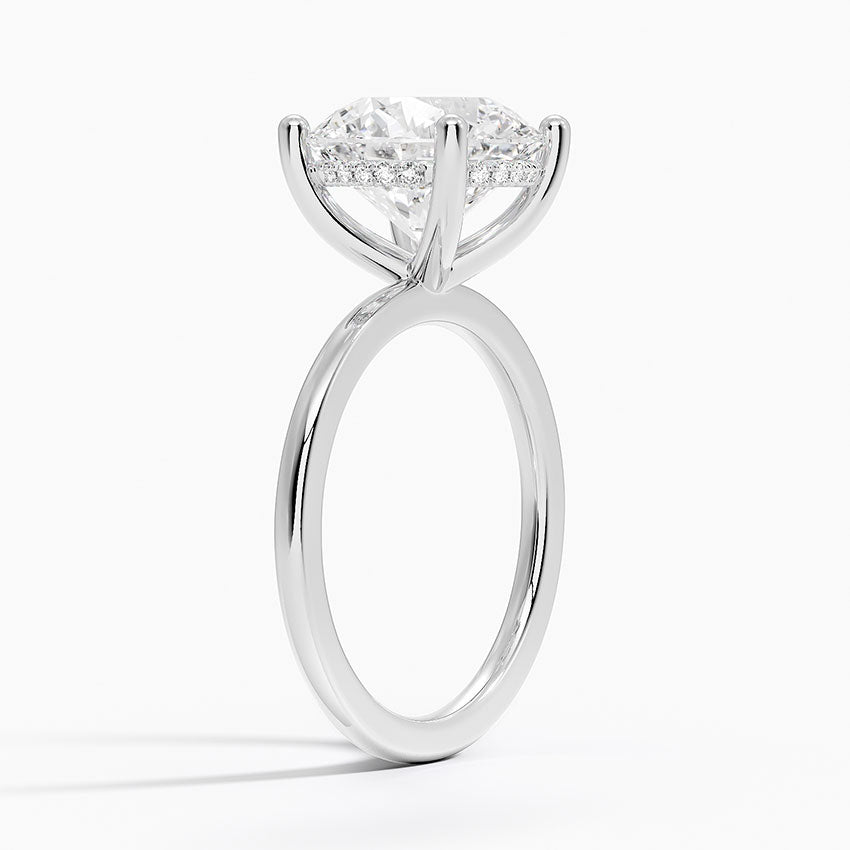 Pear Cut Diamond Solitaire Engagement Ring in Solid Gold⁠